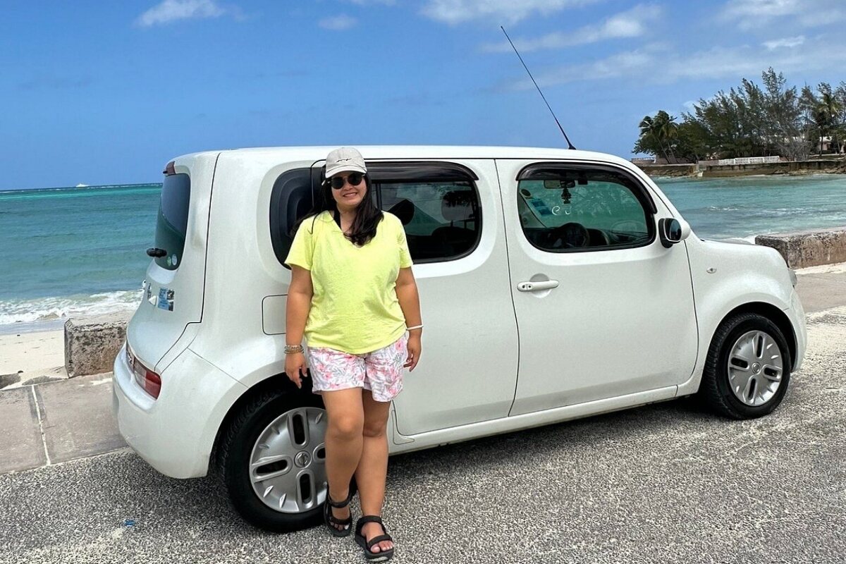 Customer with a DeeDee Nissan Cube rental in Nassau